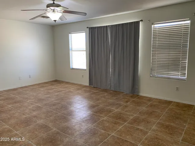 a bathroom with a shower and a glass door