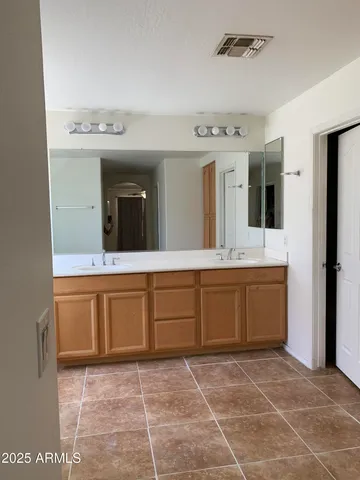 a bathroom with a sink and a bathtub