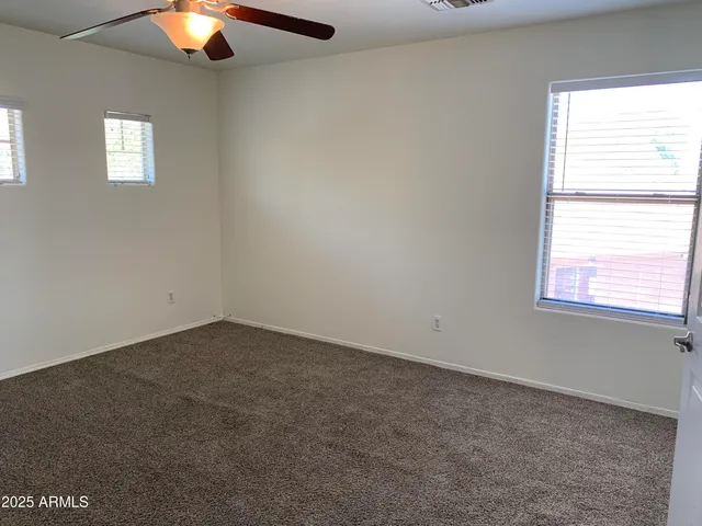 a bathroom with a toilet a sink and a shower