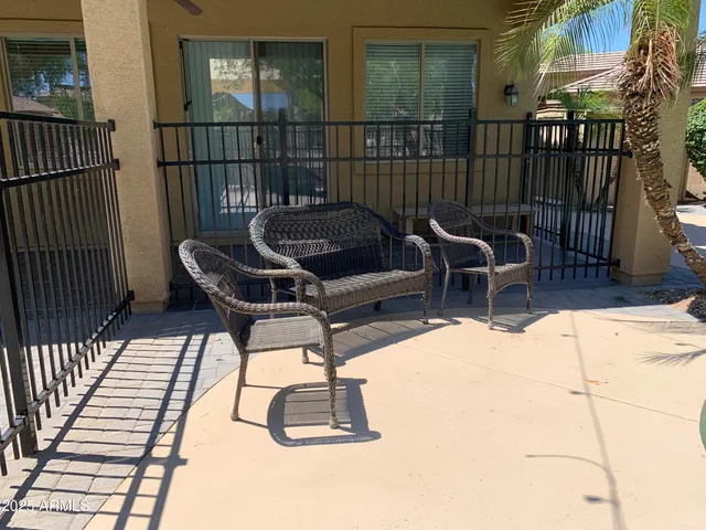 a view of a street with a building in the background