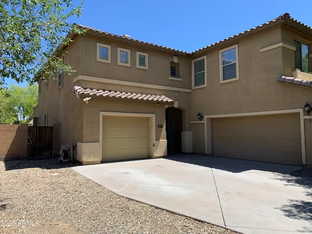 a view of backyard of a house