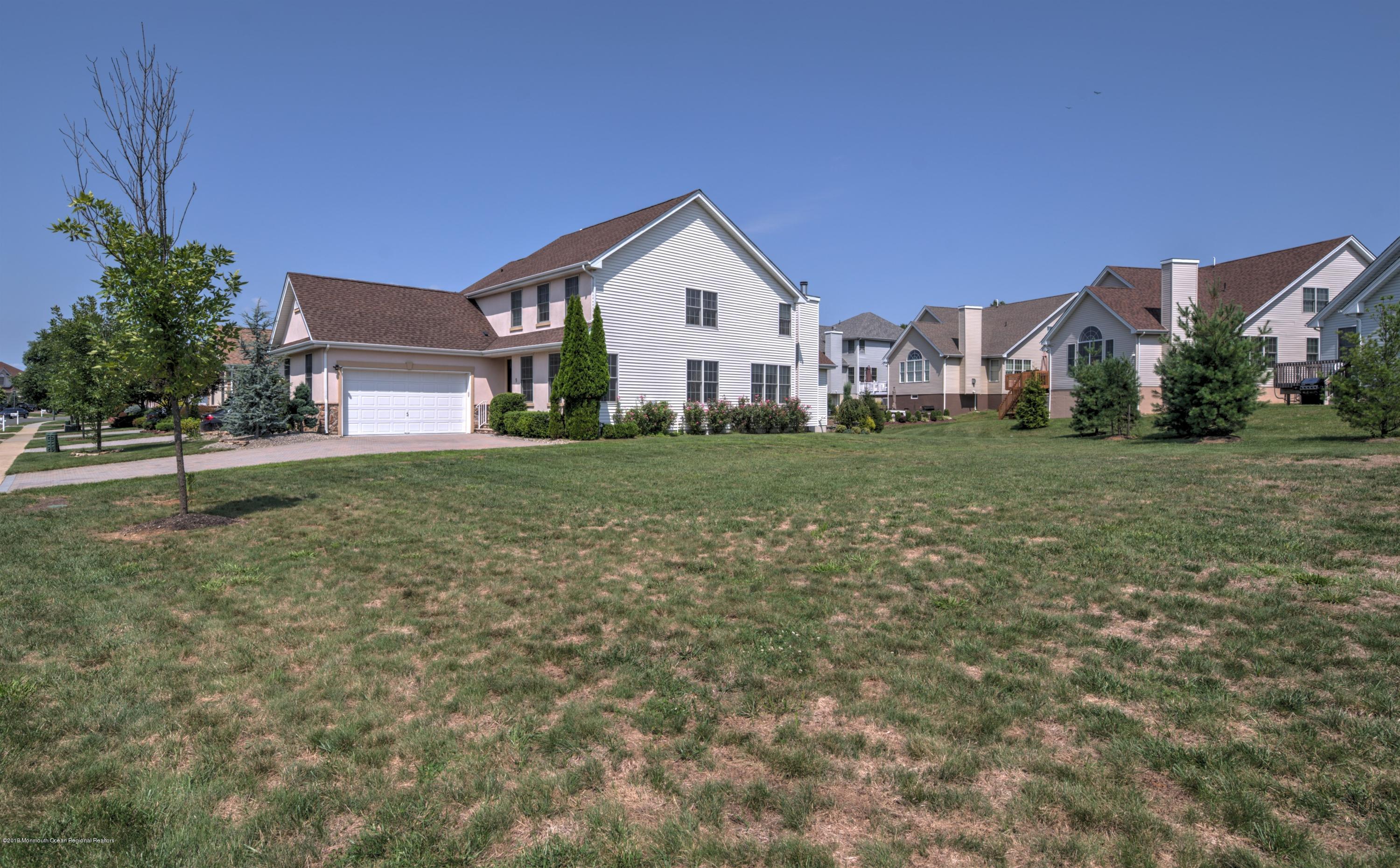 9 Vancleve Road Manalapan, NJ 07726 - Photo 3 of 34 003_FRONT