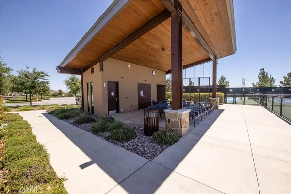 a view of a swimming pool with a patio