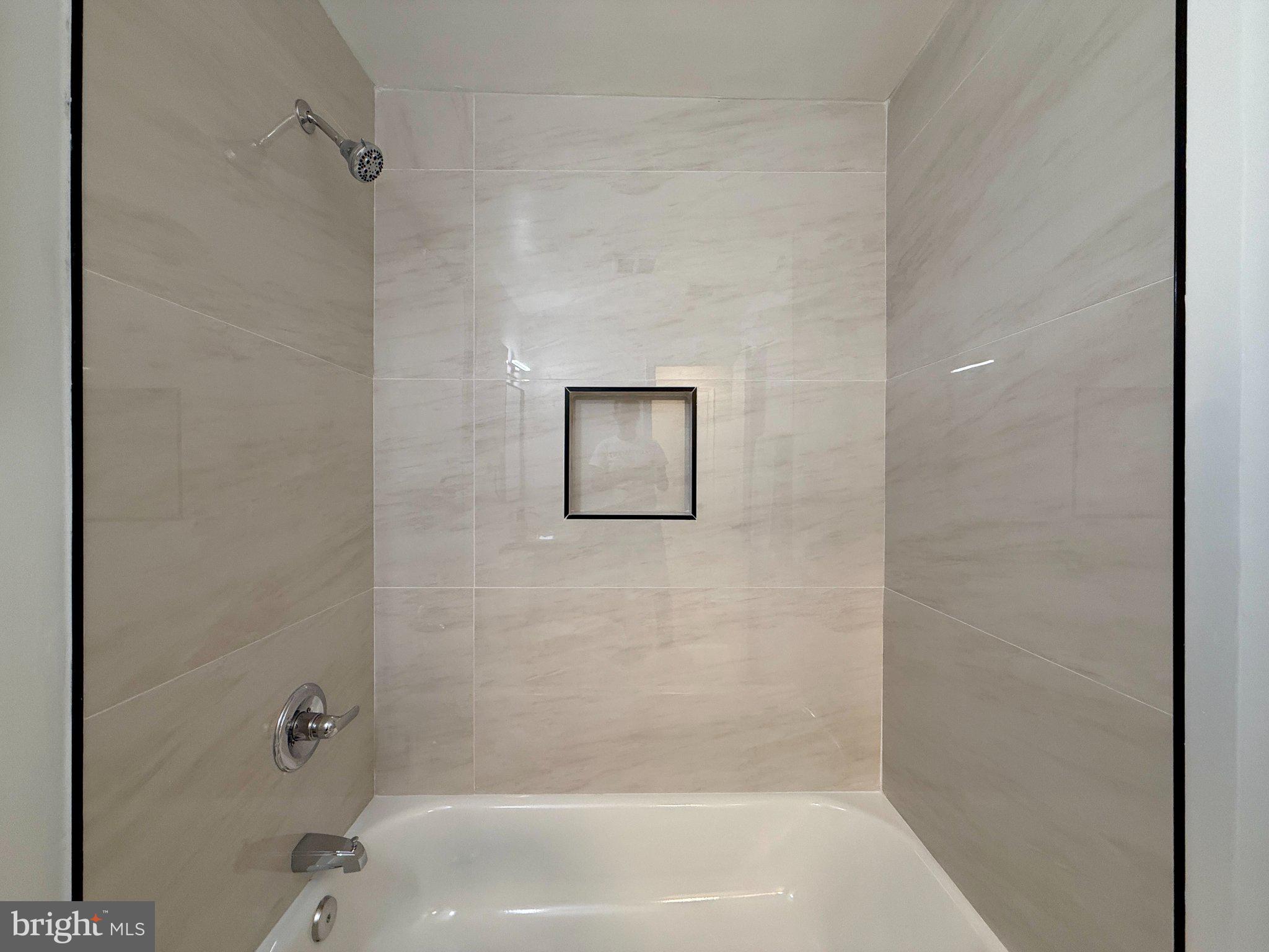 1278 Palmer Road, Unit 88 Fort Washington, MD 20744 - Photo 17 of 34 Sleek, modern shower with elegant tiles.