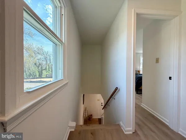 a view of balcony with furniture