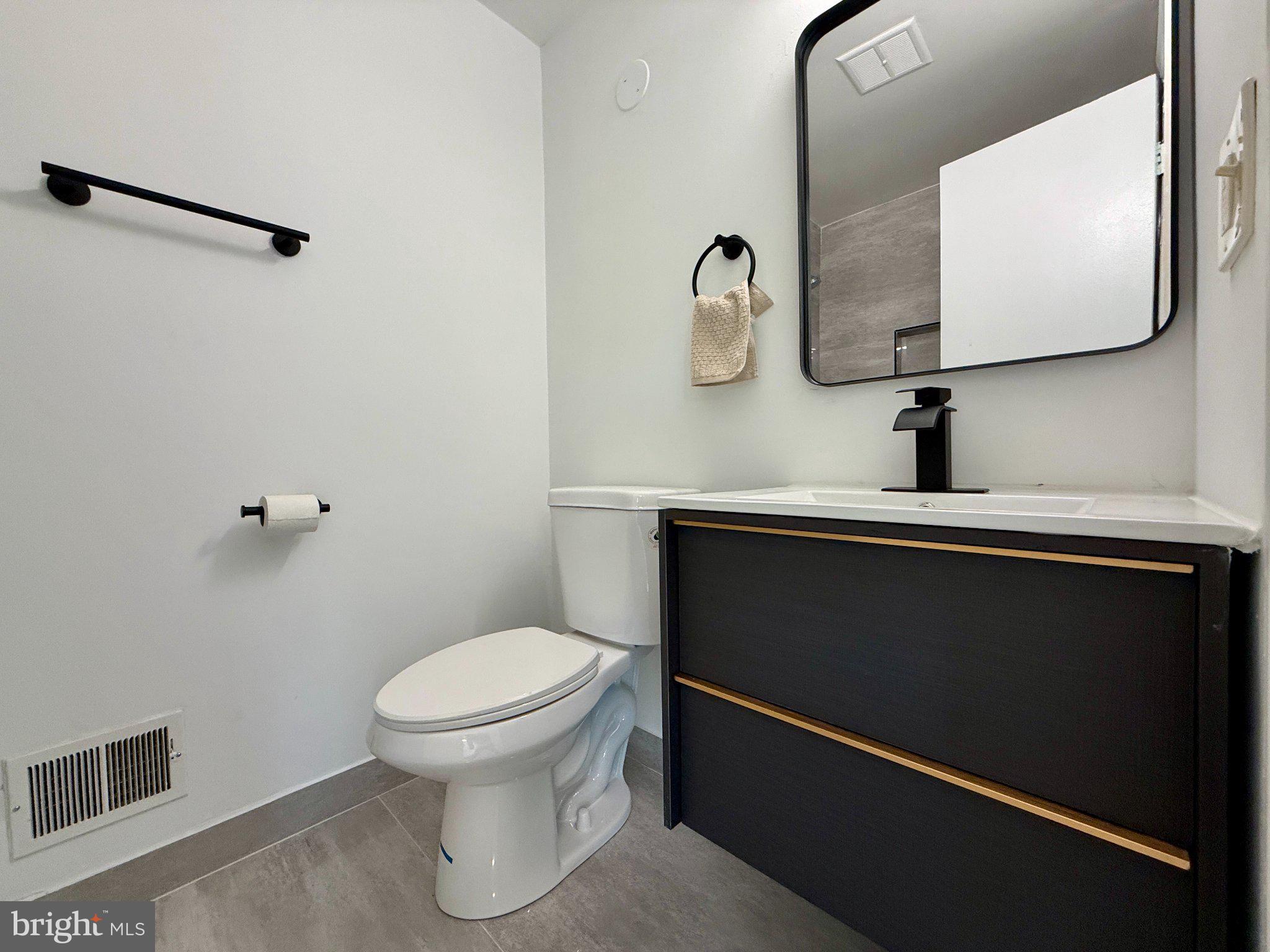 1278 Palmer Road, Unit 88 Fort Washington, MD 20744 - Photo 29 of 34 Sleek modern bathroom with stylish accents.