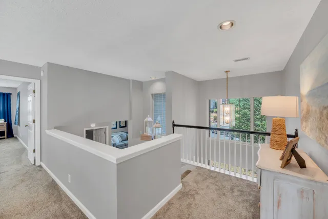 a view of living room with furniture and a window