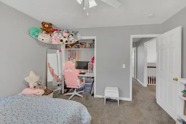 a bedroom with furniture and a couch