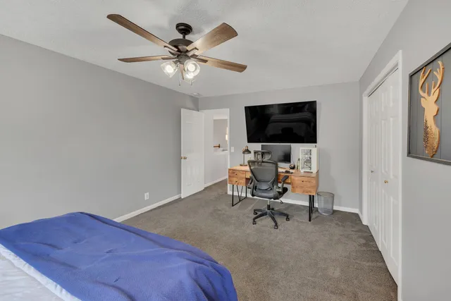 a workspace with a flat screen tv