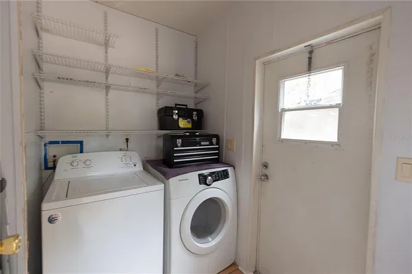 a view of a house with backyard