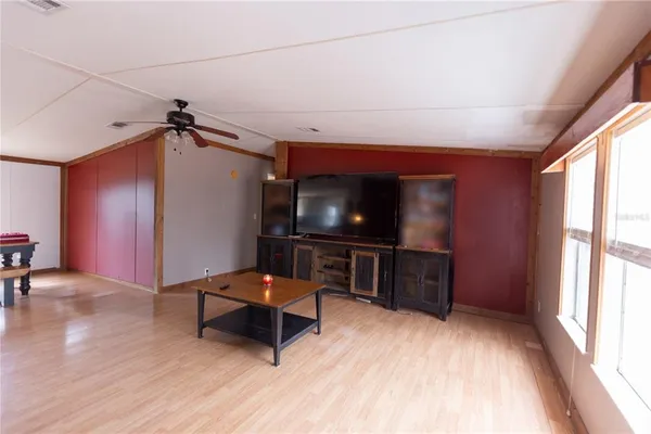 a kitchen with stainless steel appliances a sink stove and cabinets