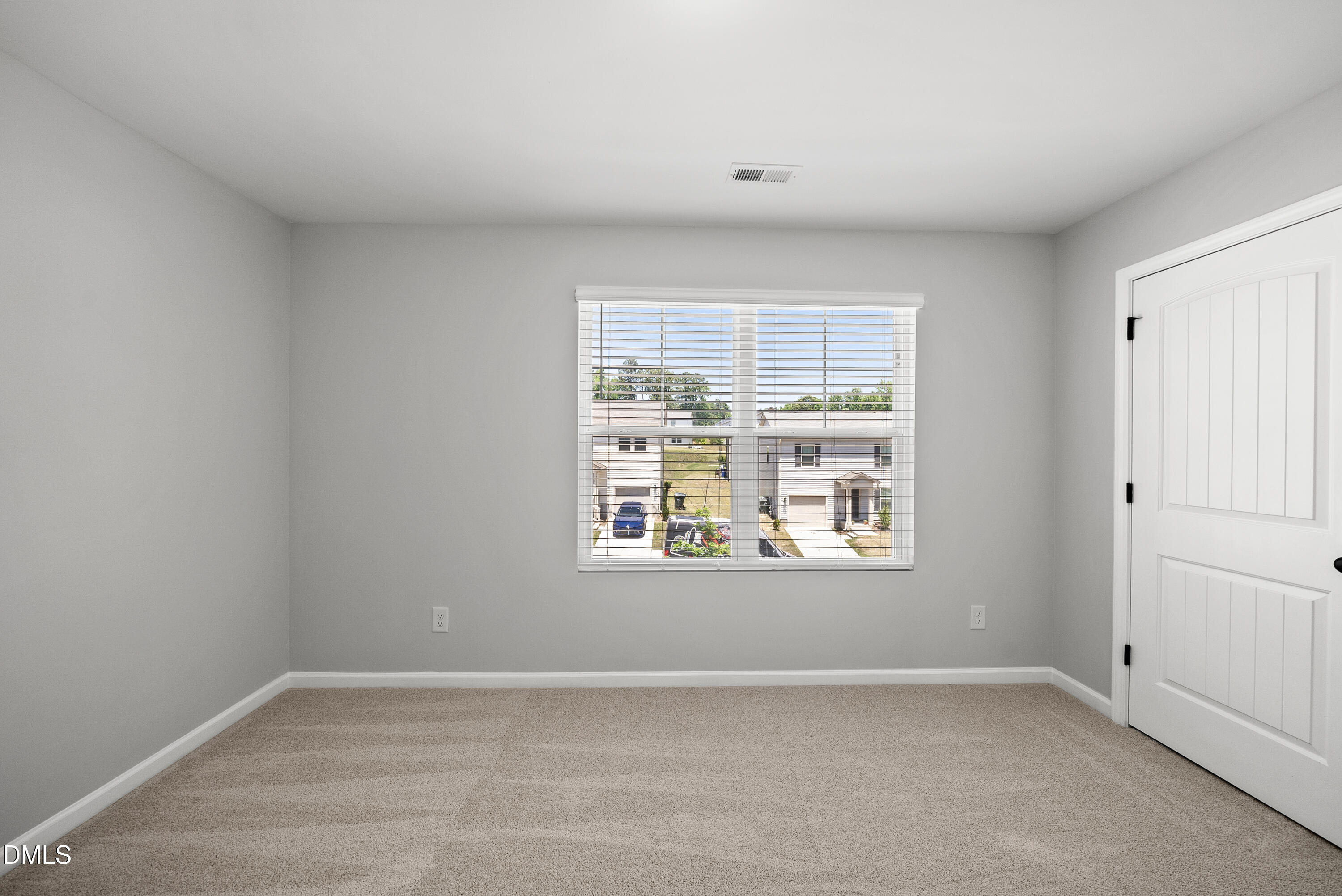 2816 Elsa Drive Raleigh, NC 27610 - Photo 23 of 35 an empty room with a window