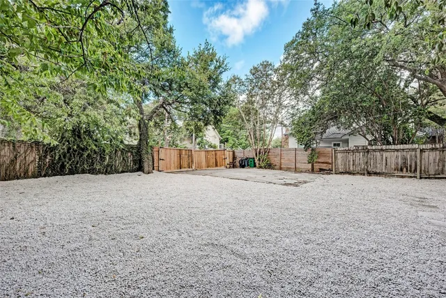 a wooden fence with a trees