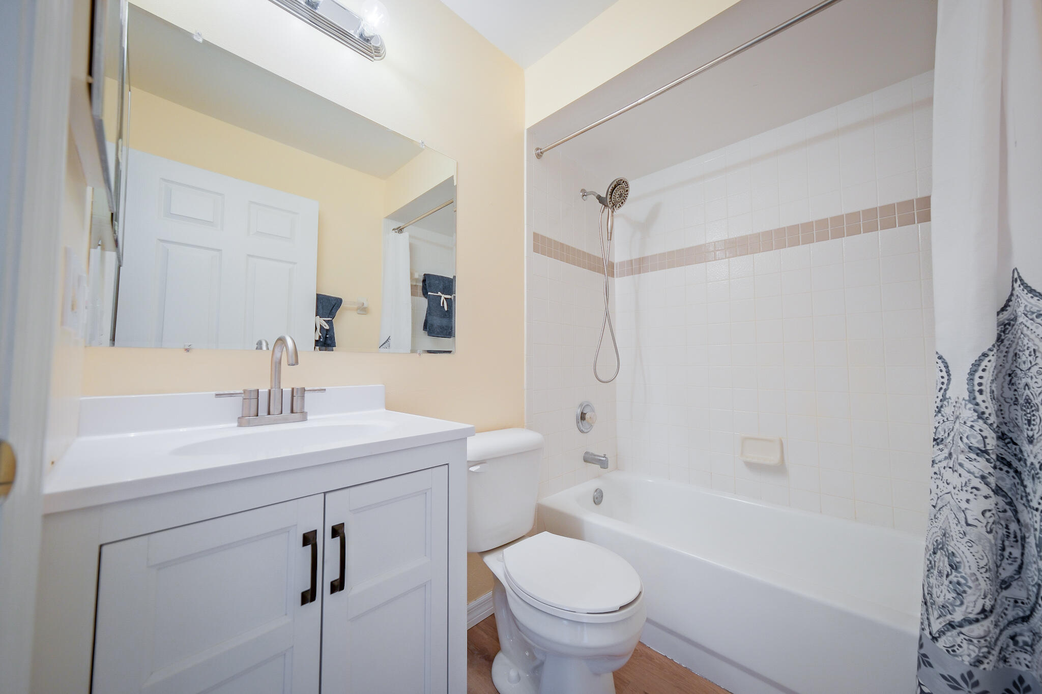 762 Gerlitz Road Southwest Palm Bay, FL 32908 - Photo 18 of 29 a bathroom with a sink toilet a mirror and shower