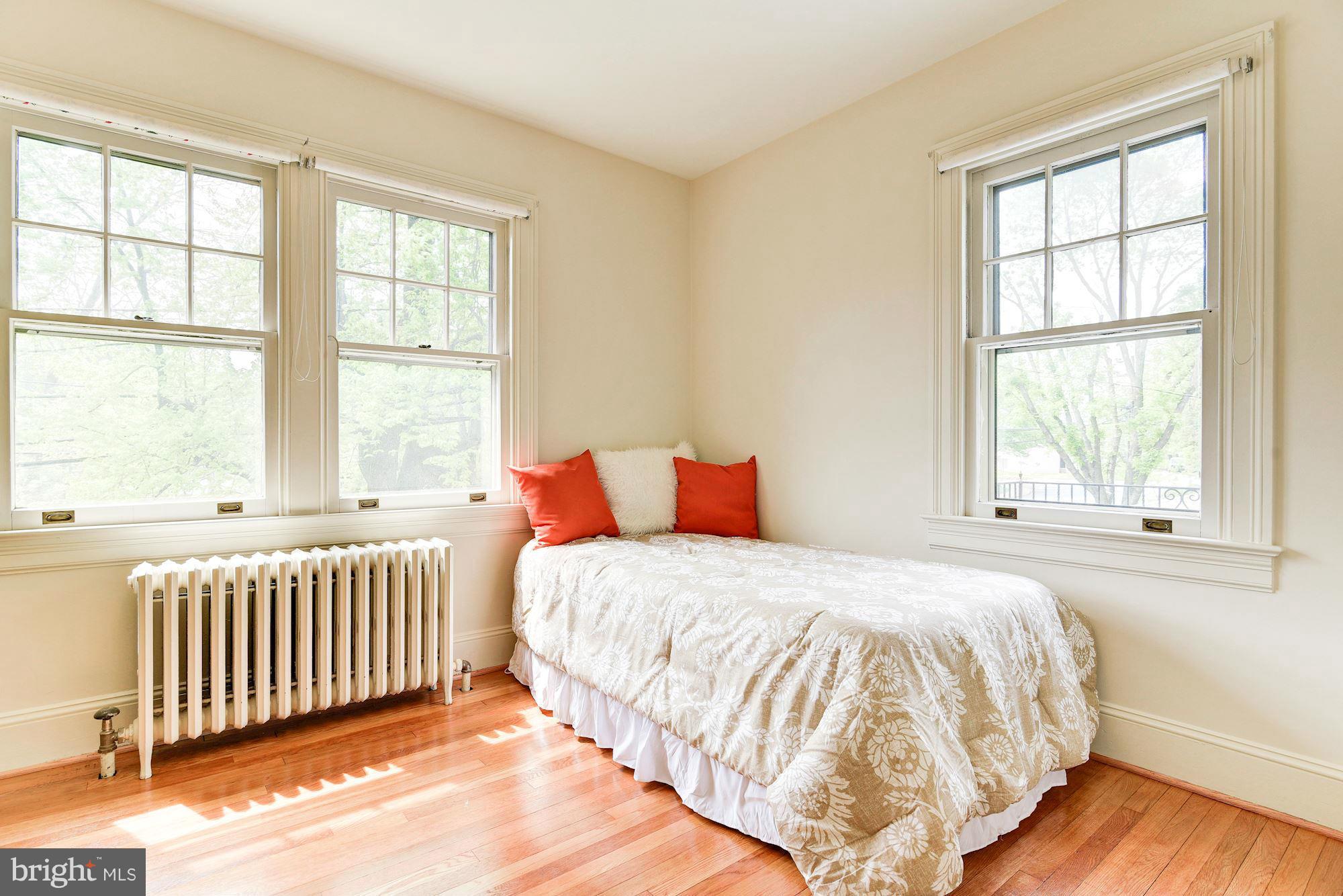 210 Baltimore Road Rockville, MD 20850 - Photo 17 of 30 a bedroom with a bed and a window