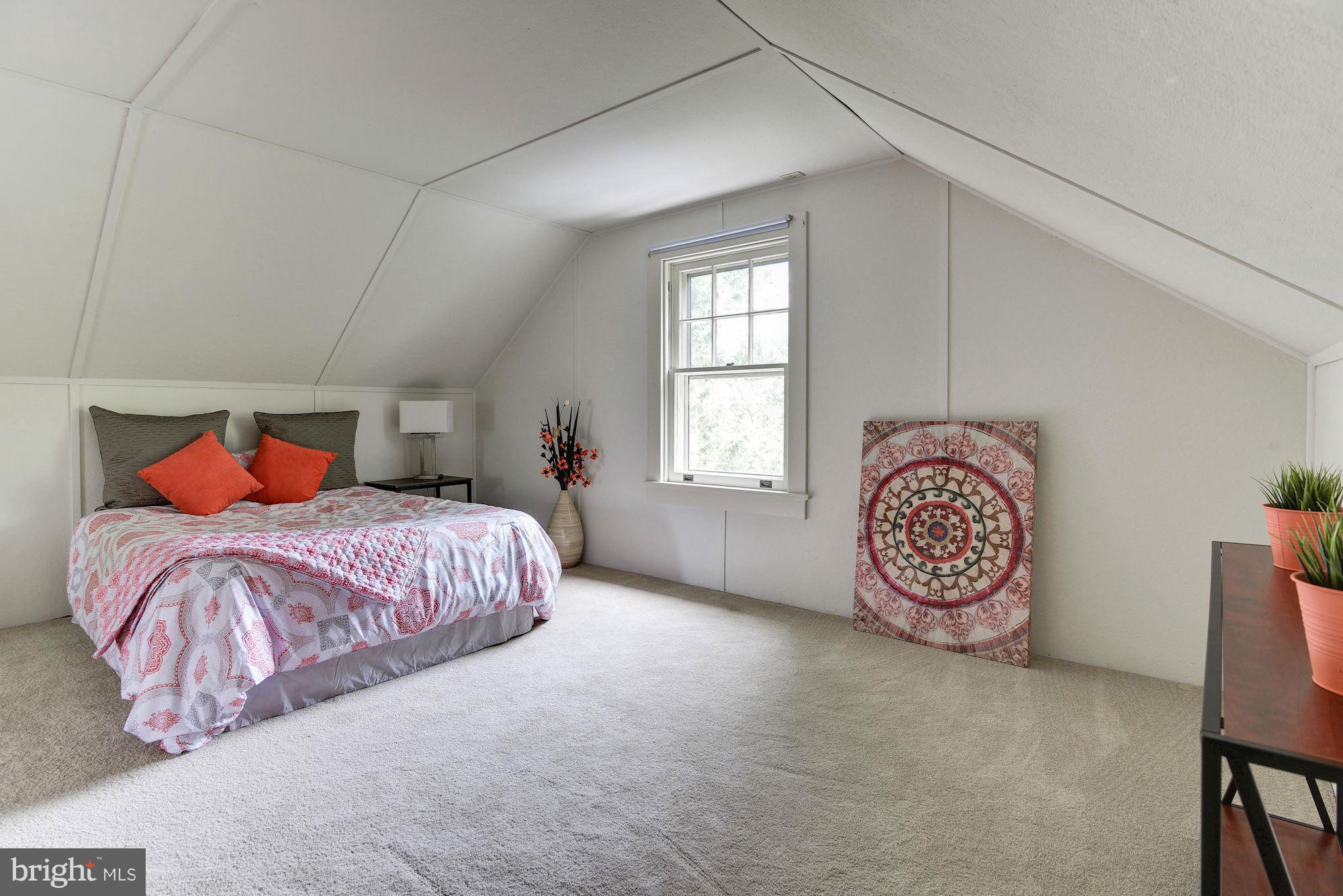 210 Baltimore Road Rockville, MD 20850 - Photo 20 of 30 a bedroom with a bed and window