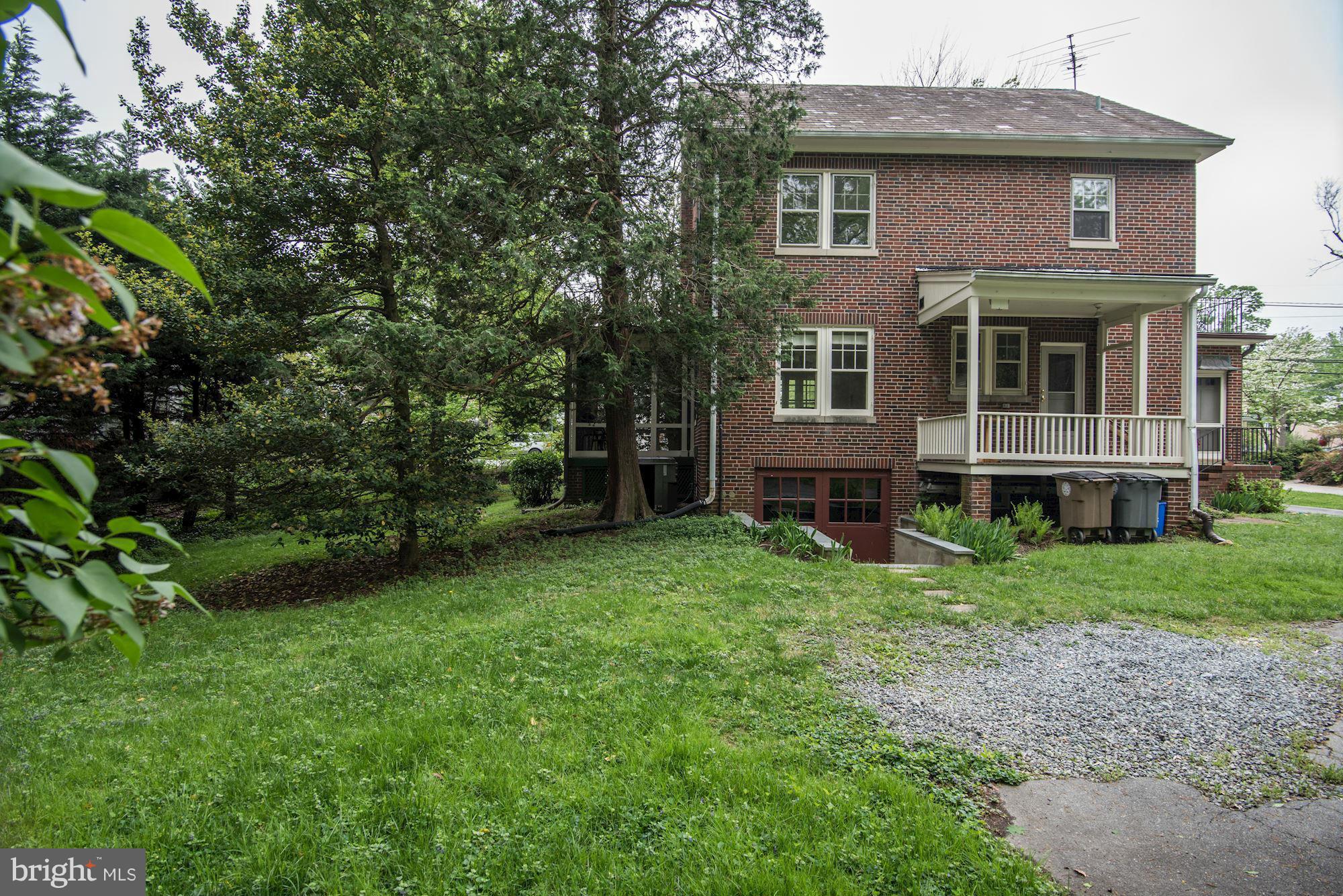 210 Baltimore Road Rockville, MD 20850 - Photo 26 of 30 a front view of a house with a garden