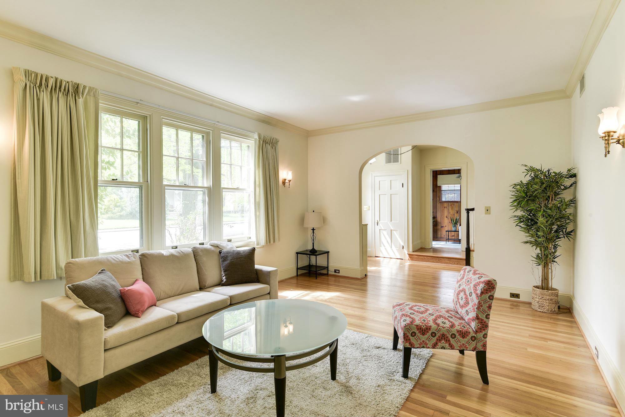 210 Baltimore Road Rockville, MD 20850 - Photo 4 of 30 a living room with furniture and a large window