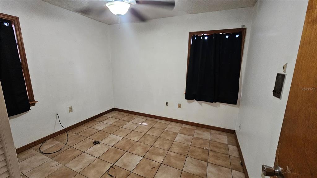 71 Dobson Street Orlando, FL 32805 - Photo 16 of 27 a view of a livingroom with wooden floor