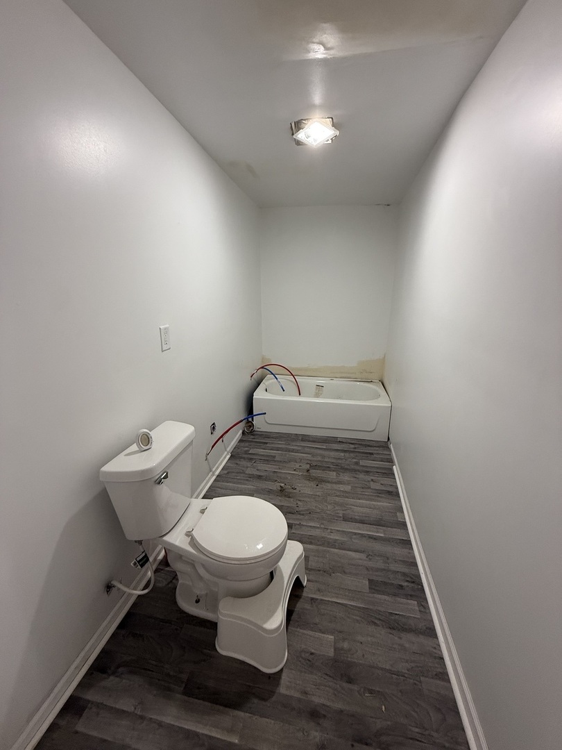 732 North Dearborn Avenue Kankakee, IL 60901 - Photo 14 of 21 a bathroom with a toilet and a sink