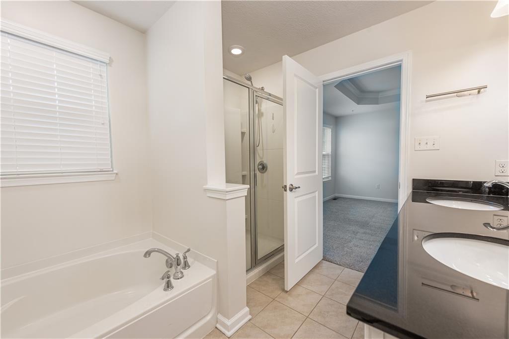 2104 Pointe View Drive Mars, PA 16046 - Photo 15 of 24 Primary bath with a soaker tub and walk in shower.