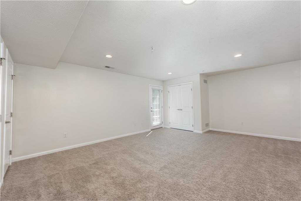 2104 Pointe View Drive Mars, PA 16046 - Photo 22 of 24 Lower level game room with door to walk out to the back yard area.