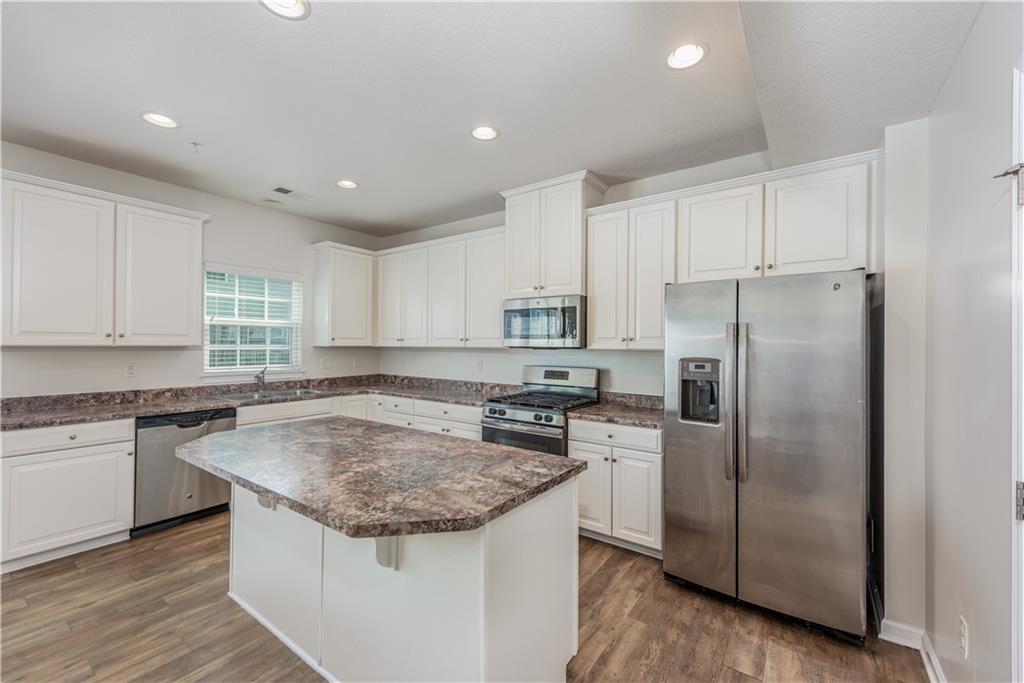 2104 Pointe View Drive Mars, PA 16046 - Photo 9 of 24 Bright white kitchen with stainless steel appliances.