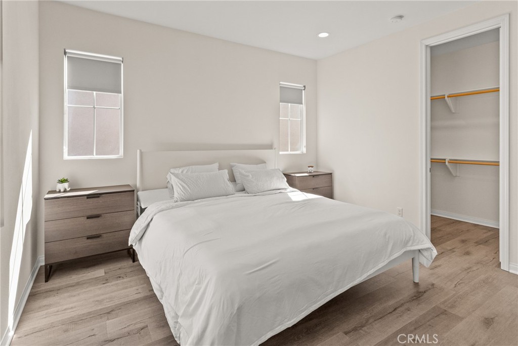 8743 Celebration Street Chino, CA 91708 - Photo 17 of 42 a bedroom with a bed and a window