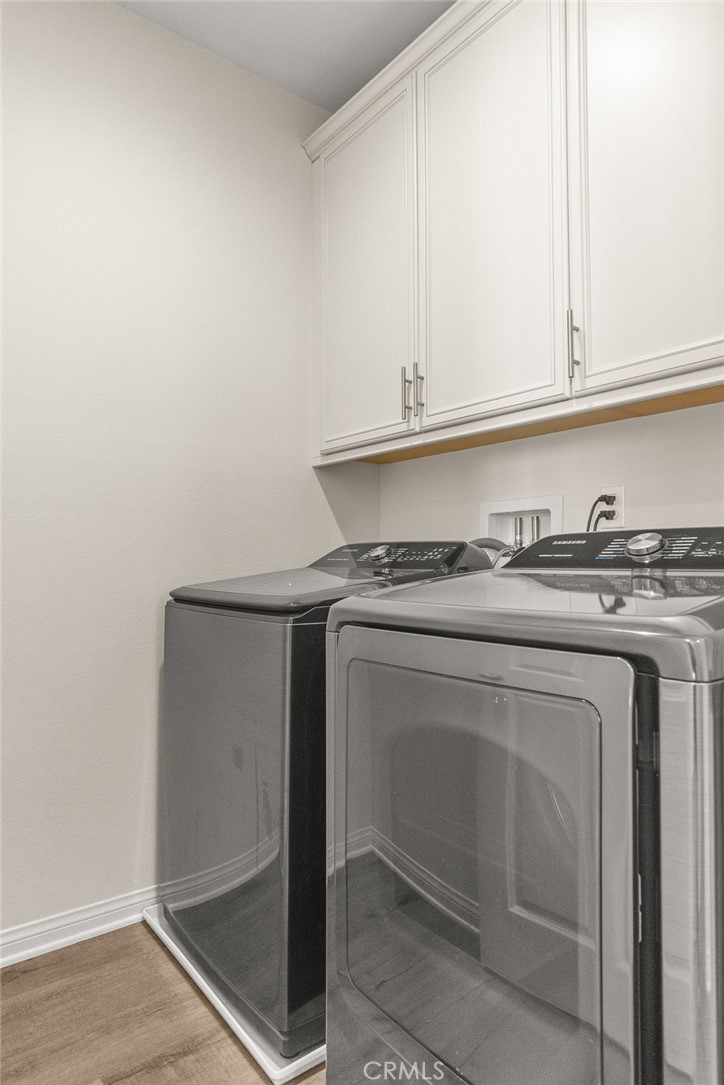8743 Celebration Street Chino, CA 91708 - Photo 35 of 42 a close view of washer and dryer