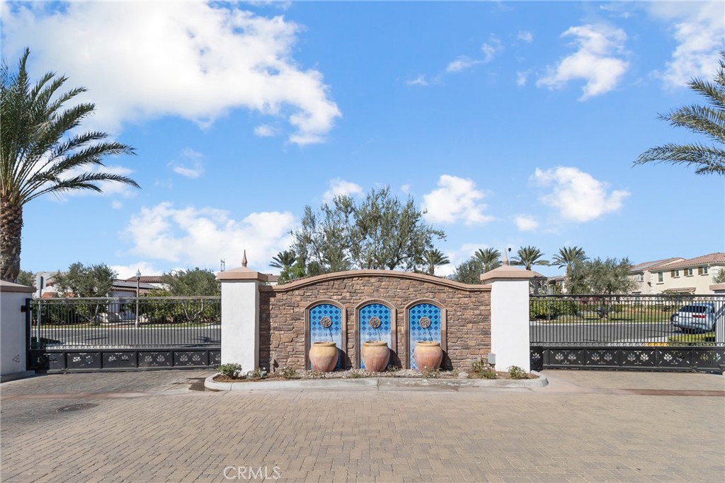 8743 Celebration Street Chino, CA 91708 - Photo 39 of 42 a front view of a house with a yard