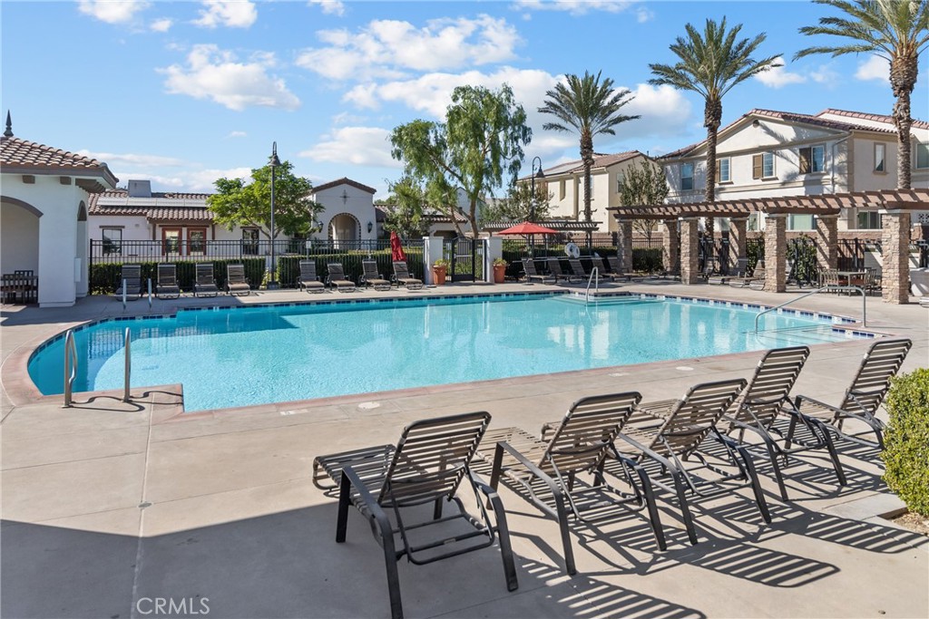 8743 Celebration Street Chino, CA 91708 - Photo 42 of 42 a view of a swimming pool with lounge chairs