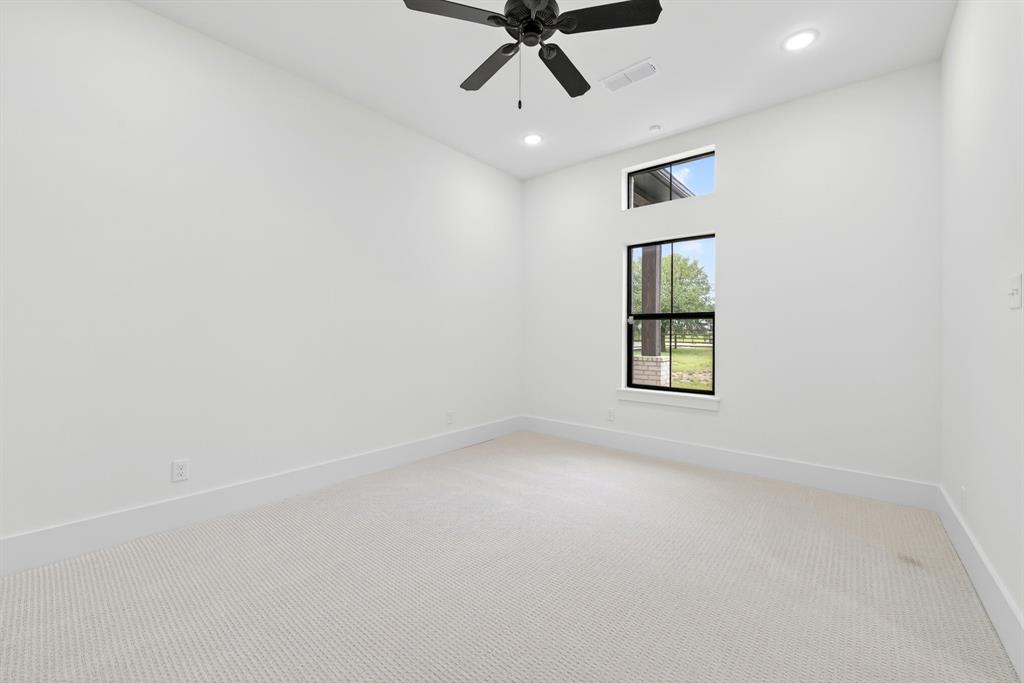 10373 Bobbie Lane Pilot Point, TX 76258 - Photo 24 of 40 One of 3 secondary bedrooms downstairs