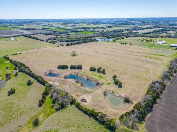 an aerial view of beach and ocean