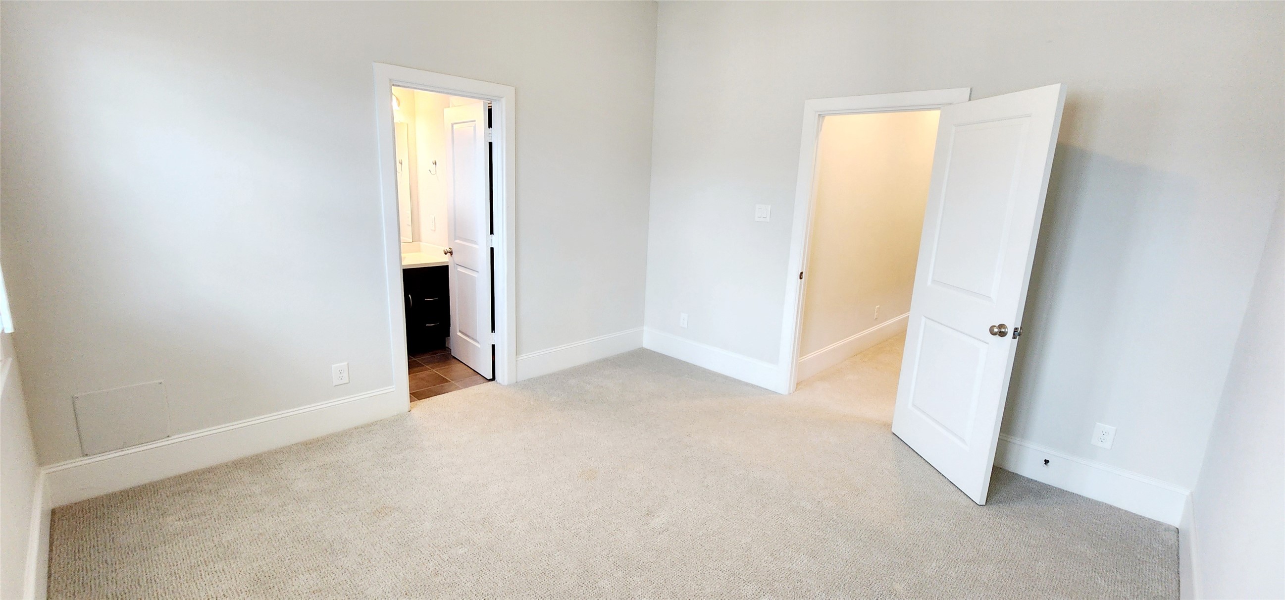11 West Rafters Row The Woodlands, TX 77380 - Photo 23 of 31 an empty room with windows