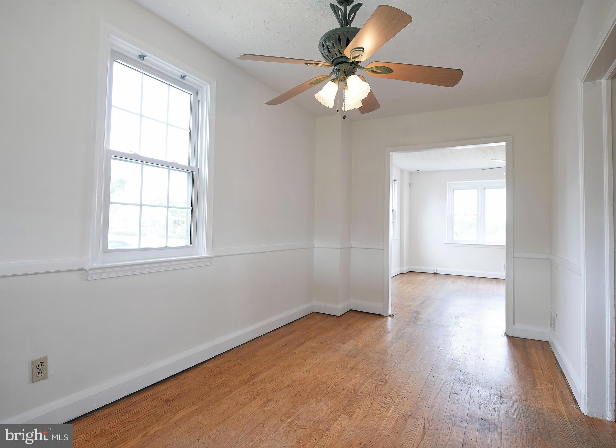7601 Parkwood Road Baltimore, MD 21222 - Photo 17 of 32 Dining Room With Chair Rail Molding