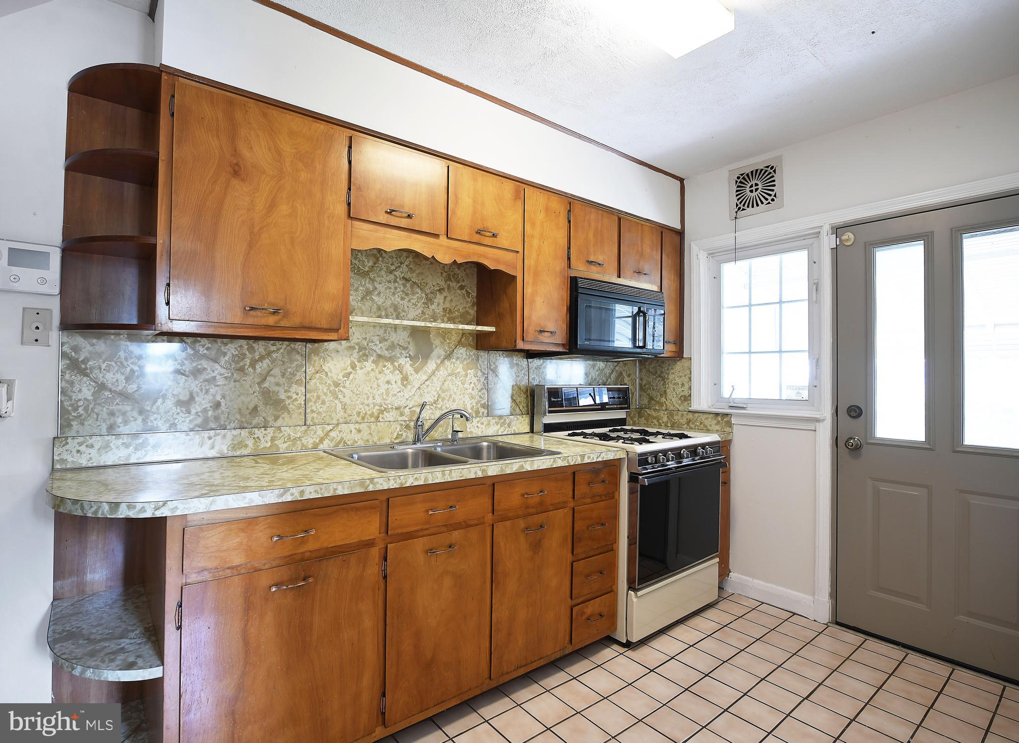 7601 Parkwood Road Baltimore, MD 21222 - Photo 18 of 32 Clean And Functional Kitchen