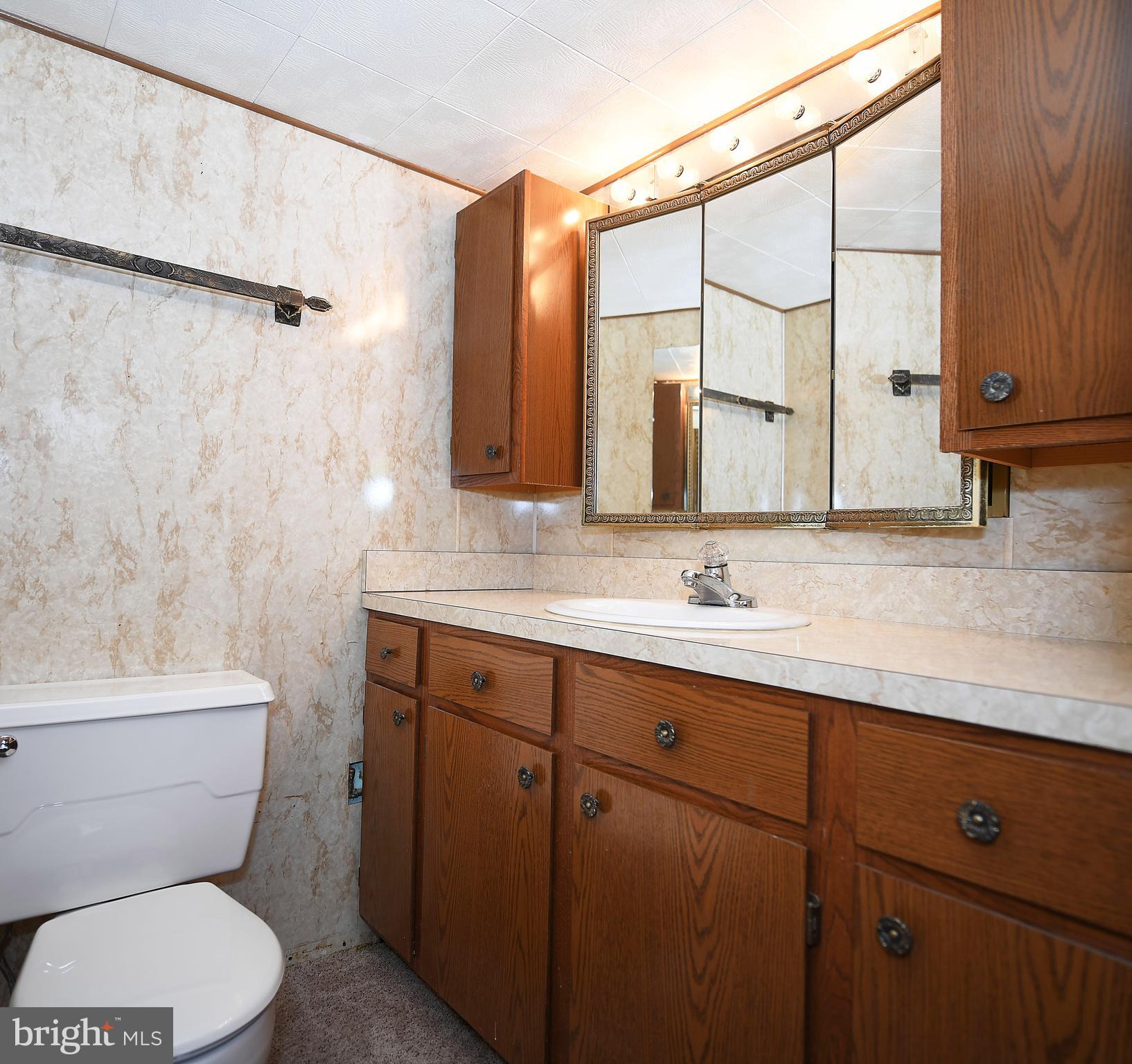7601 Parkwood Road Baltimore, MD 21222 - Photo 31 of 32 Spacious Half Bath