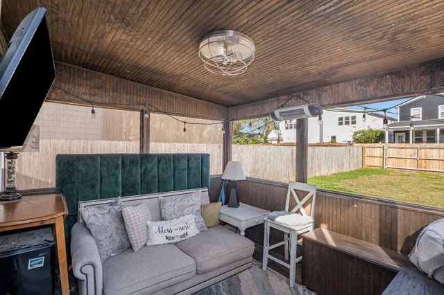 a outdoor living space with furniture and garden view