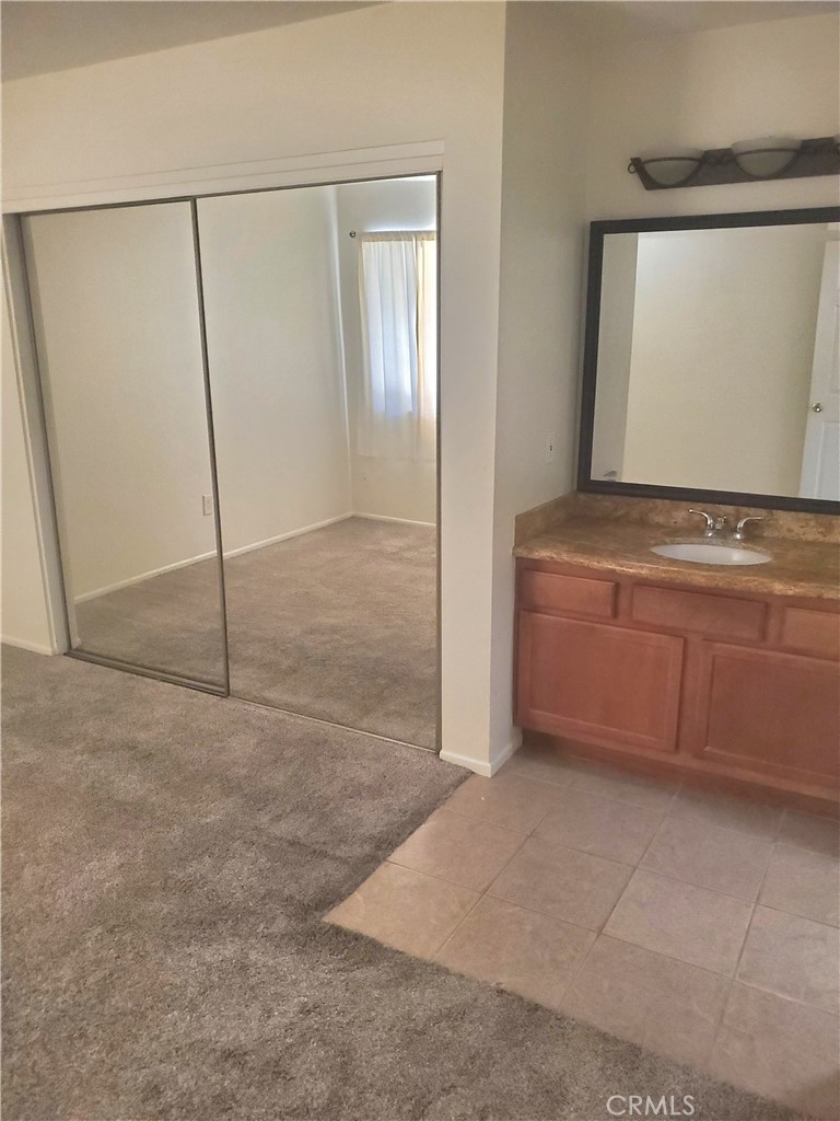 1110 West Blaine Street, Unit 107 Riverside, CA 92507 - Photo 18 of 34 a view of a room with cabinet