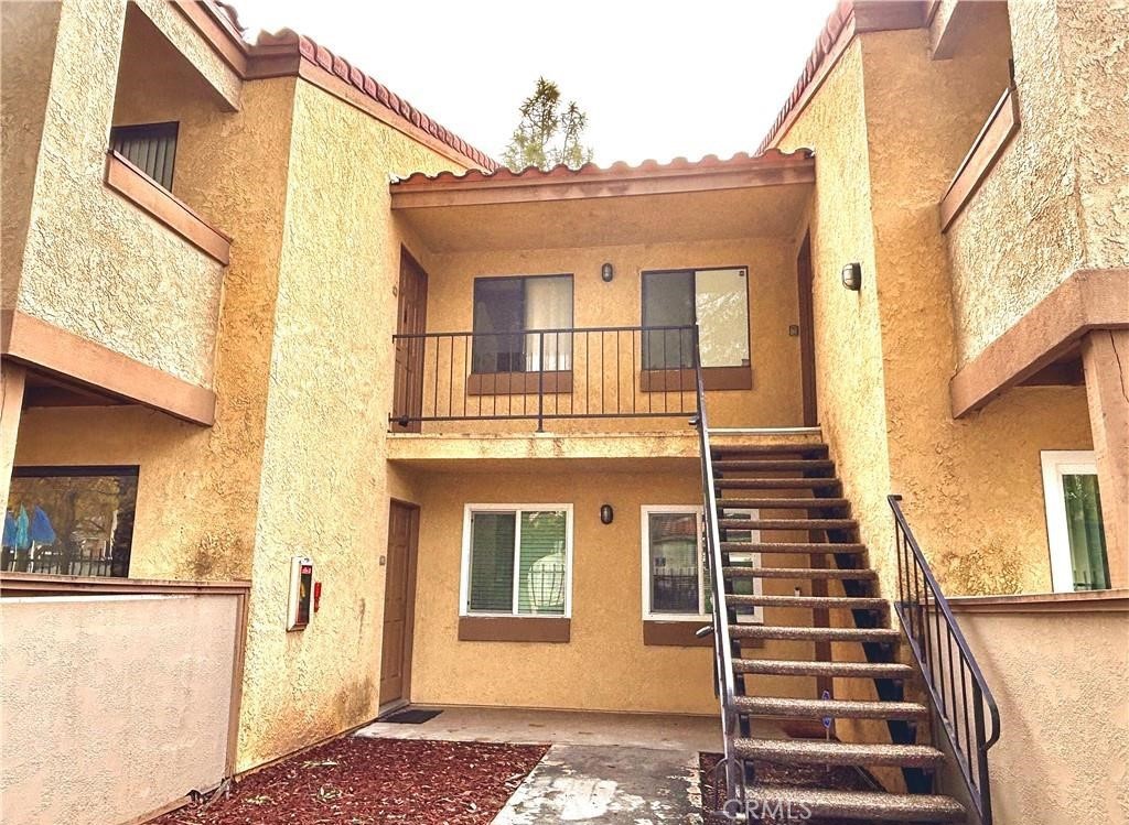 1110 West Blaine Street, Unit 107 Riverside, CA 92507 - Photo 2 of 34 a view of a building with a window