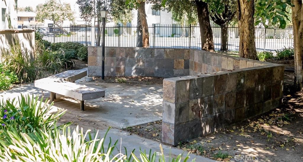 1110 West Blaine Street, Unit 107 Riverside, CA 92507 - Photo 31 of 34 a view of outdoor space and lake view