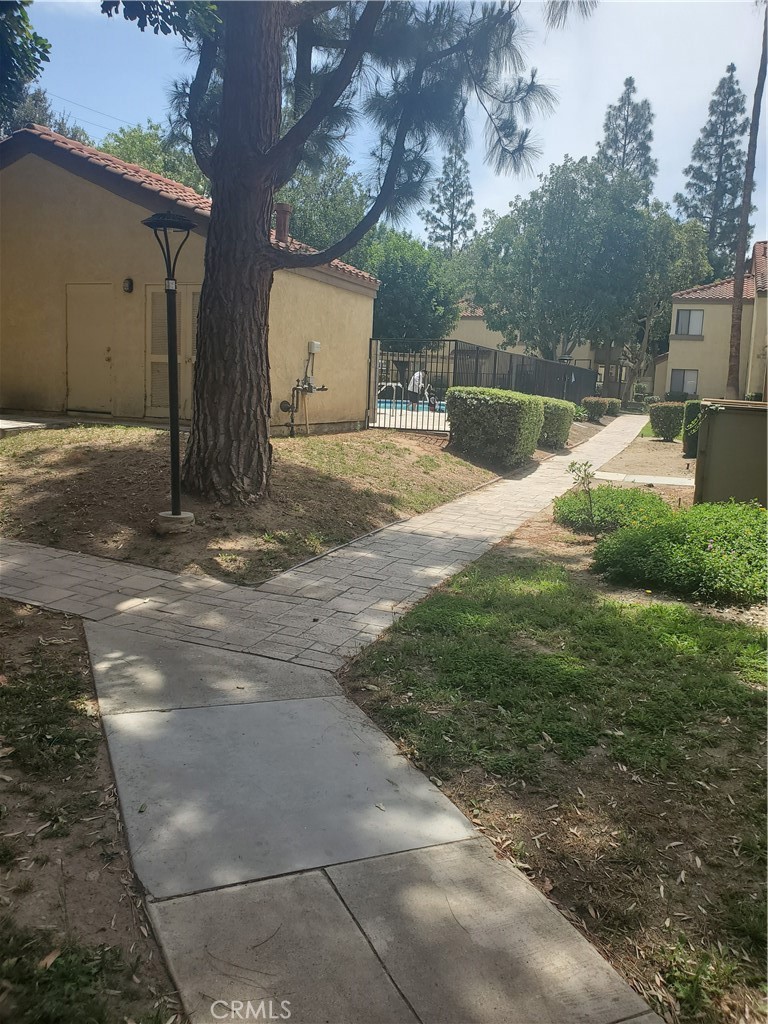 1110 West Blaine Street, Unit 107 Riverside, CA 92507 - Photo 33 of 34 a view of a back yard of the house