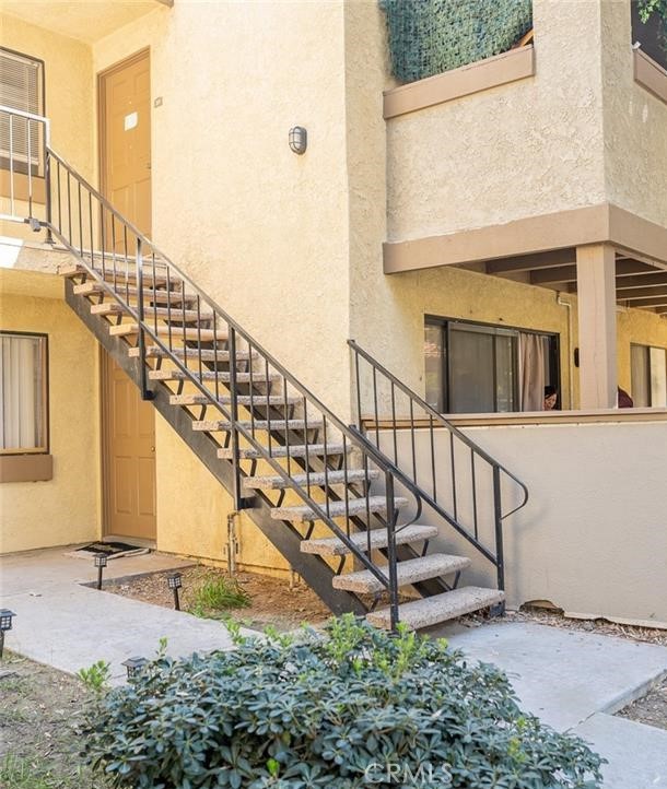1110 West Blaine Street, Unit 107 Riverside, CA 92507 - Photo 5 of 34 a view of entryway with a yard