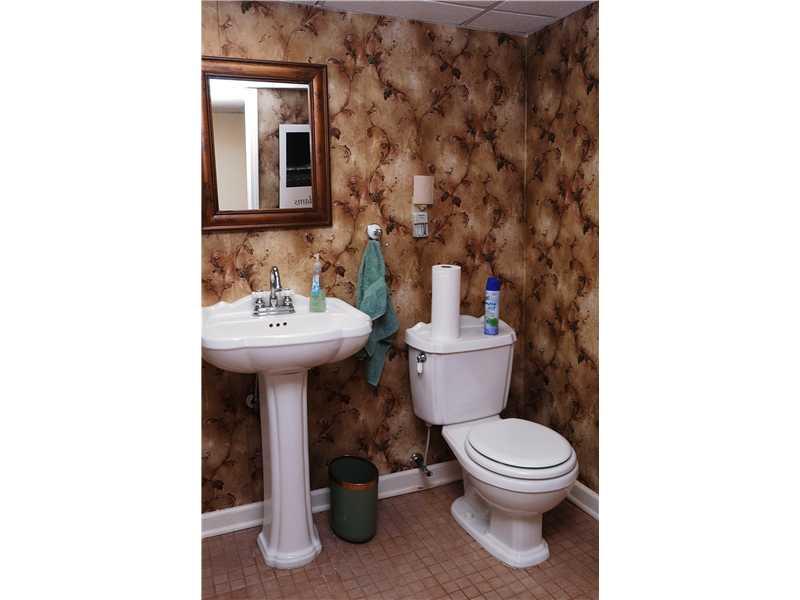 745 Spring Street Harmony, PA 16037 - Photo 24 of 25 Partial Bath. Great Partial Bath off the finished family room on the lower level.