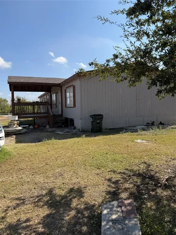 a view of a house with swimming pool