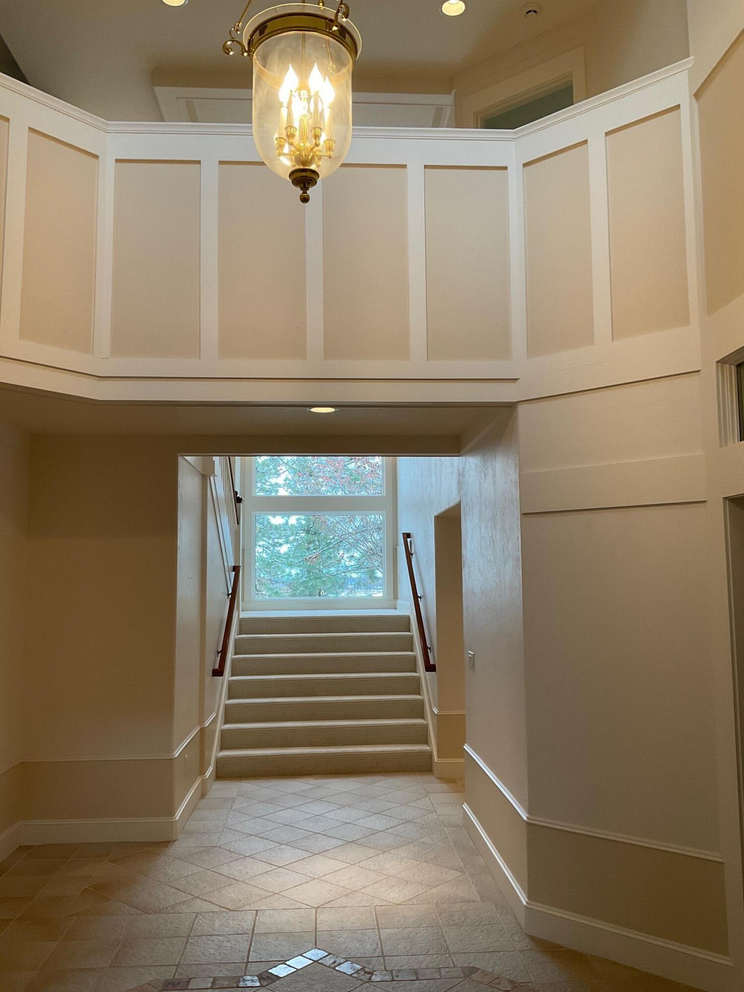 11944 Kestrel Road Klamath Falls, OR 97601 - Photo 13 of 121 This set of stairs if off the entry, and to the right.