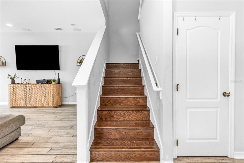 239 Lugano Way DeBary, FL 32713 - Photo 21 of 52 a view of entryway and hall with wooden floor