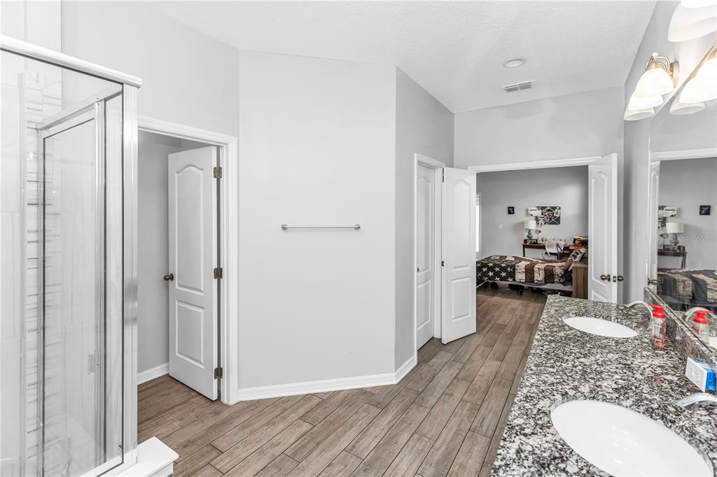 239 Lugano Way DeBary, FL 32713 - Photo 30 of 52 a very nice looking room with wooden floor