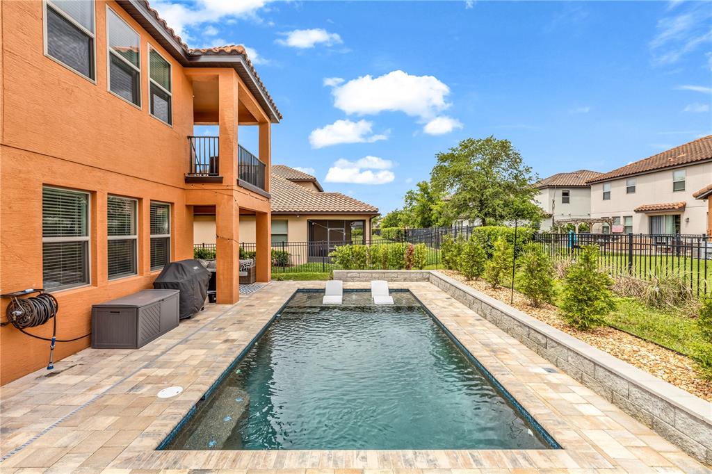 239 Lugano Way DeBary, FL 32713 - Photo 44 of 52 a view of swimming pool with outdoor seating
