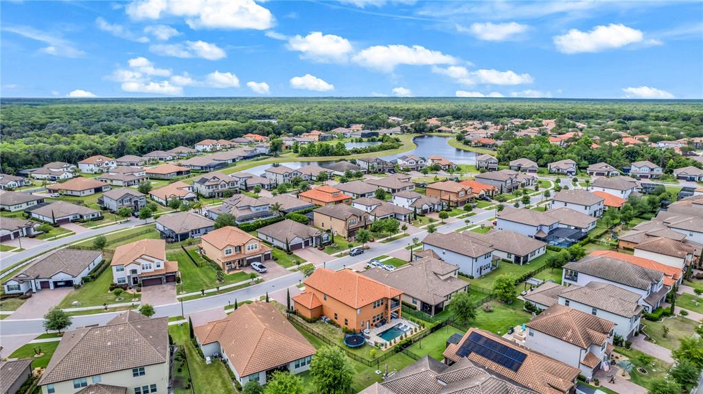 239 Lugano Way DeBary, FL 32713 - Photo 48 of 52 an aerial view of a city
